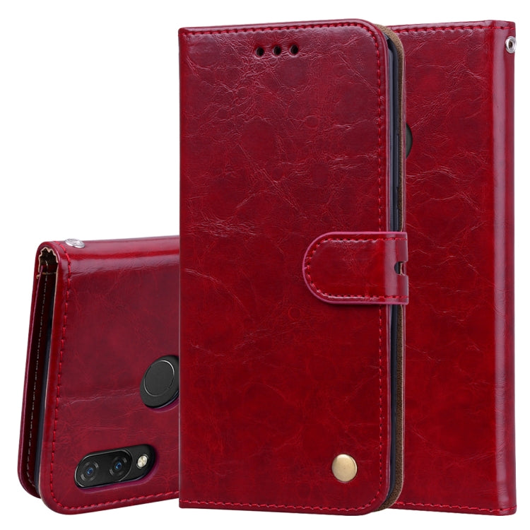 Red leather-look flip wallet phone case with magnetic closure and card slots