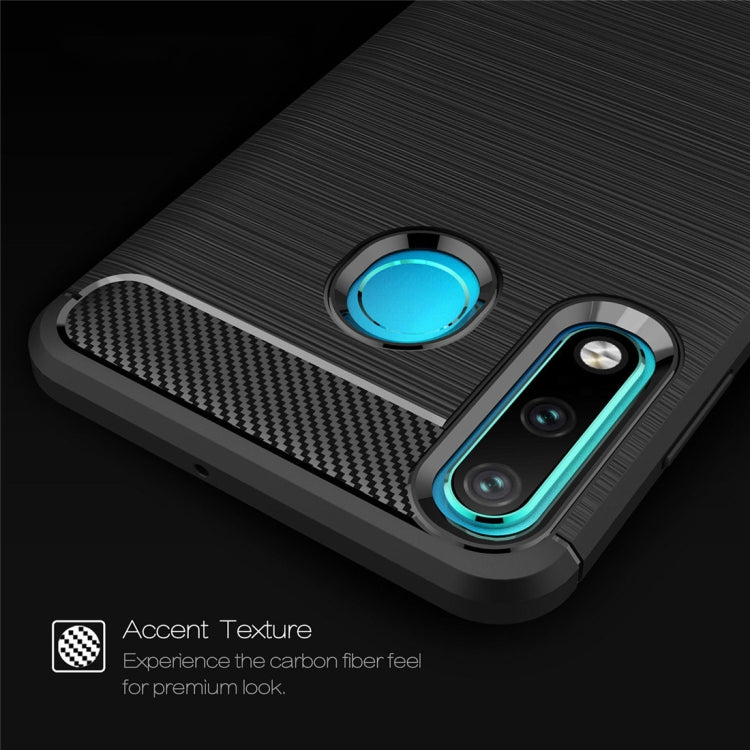 Brushed carbon fiber TPU phone case close-up with blue accent ring and camera cutouts