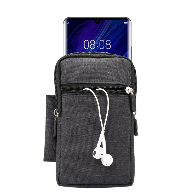 Black phone waist pack holding a smartphone with visible screen and earbud cord