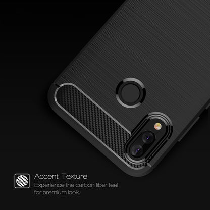 Huawei P20 Lite TPU case close-up, black brushed texture with camera lenses and ring holder