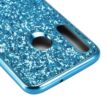 Blue glittery TPU phone case close-up with circular cutout and camera opening