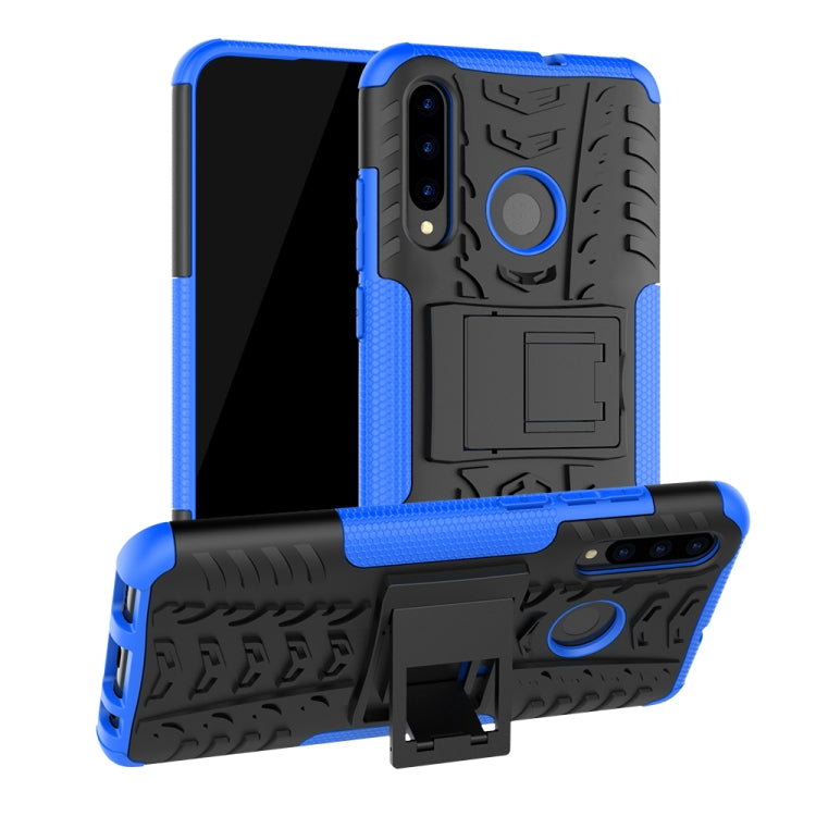 Shockproof phone case with tire tread texture, blue edges, black back, built-in holder stand