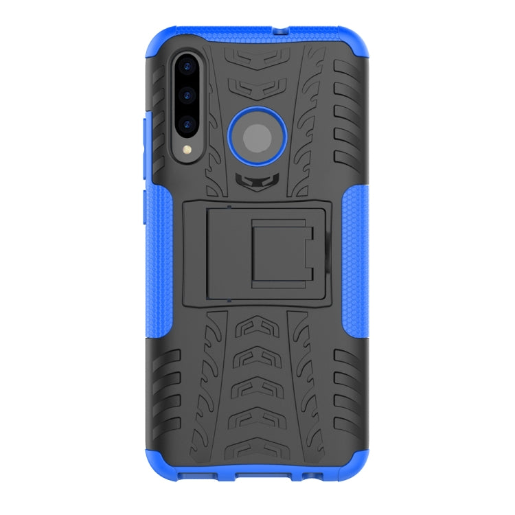 Shockproof phone case with tire tread texture, blue trim, black back, camera cutouts