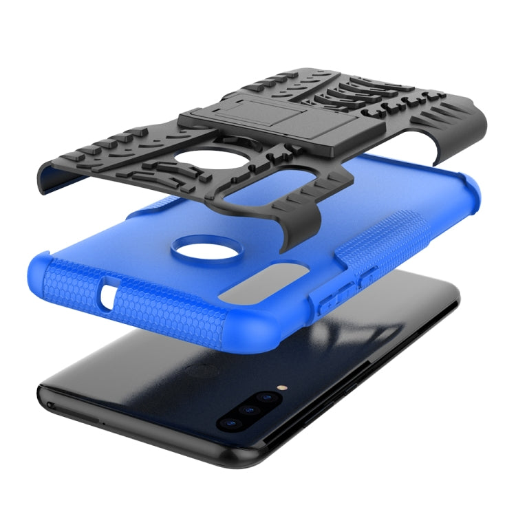 Shockproof phone case set with blue TPU front and black cover, holder stand and cutouts