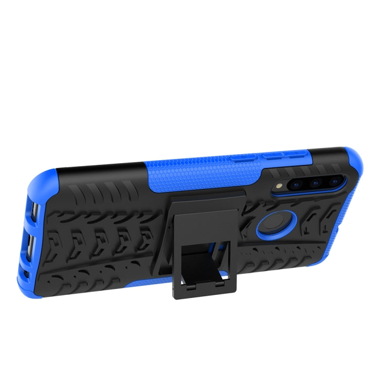 Shockproof phone case with tire tread texture, blue accents, black back, built-in holder