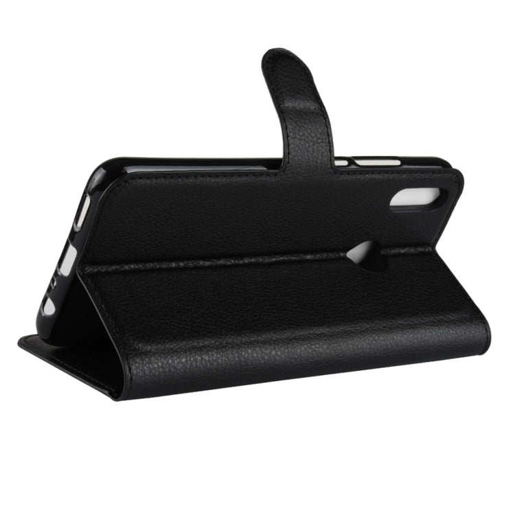 Black folio flip phone case with kickstand for hands-free viewing