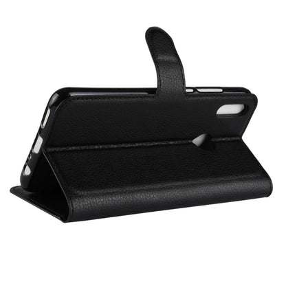 Black folio flip phone case with kickstand for hands-free viewing