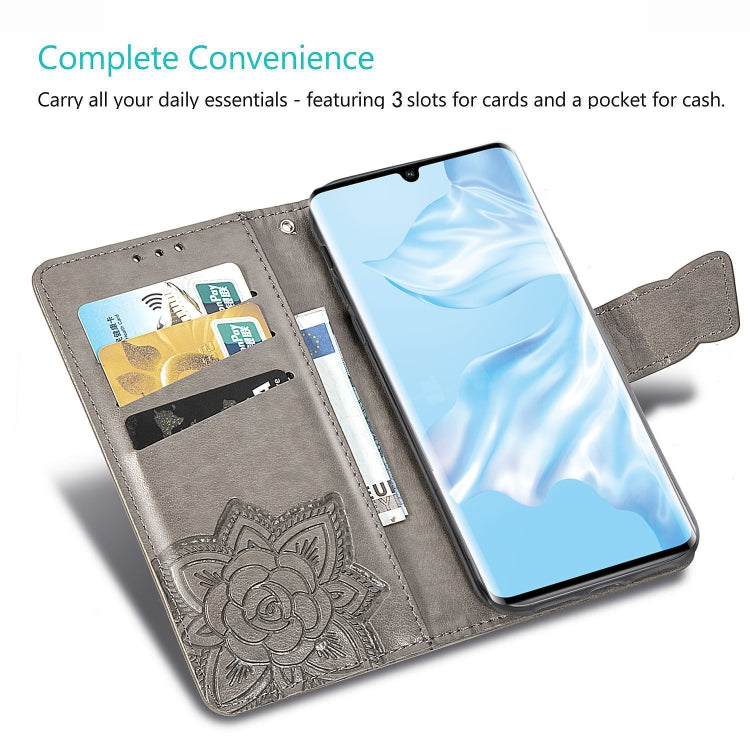 Grey leather phone wallet case with embossed floral design, card slots and cash pocket