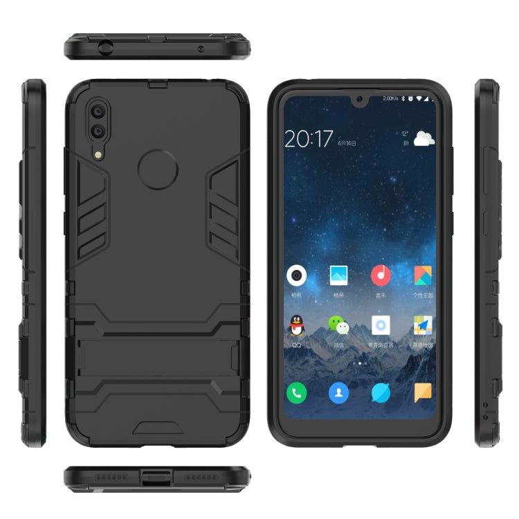 Shockproof phone case with holder, black case shown with side cutouts