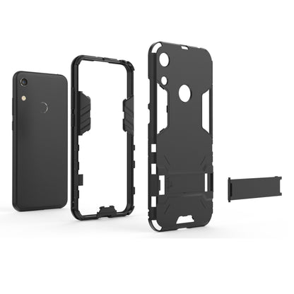 Shockproof phone case with holder, black rugged shell shown front and back