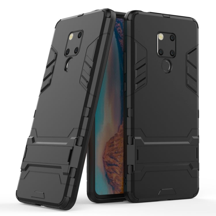 Shockproof black phone case with textured grip and camera guard