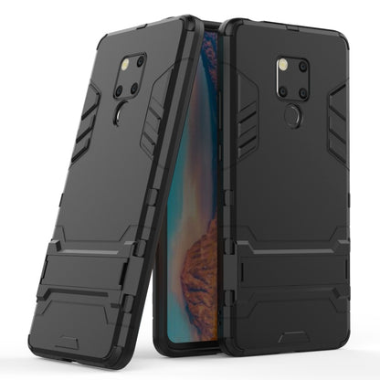 Shockproof black phone case with textured grip and camera guard