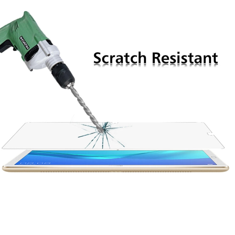 Tempered glass screen protector being applied to tablet screen with tool