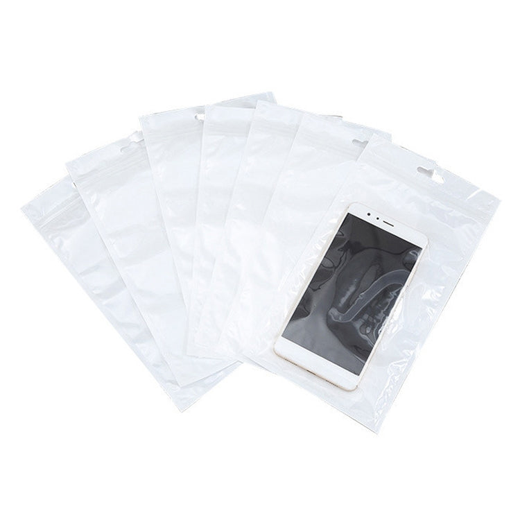 White clear-front zip jewelry bags with hang holes, shown with a phone-sized slot