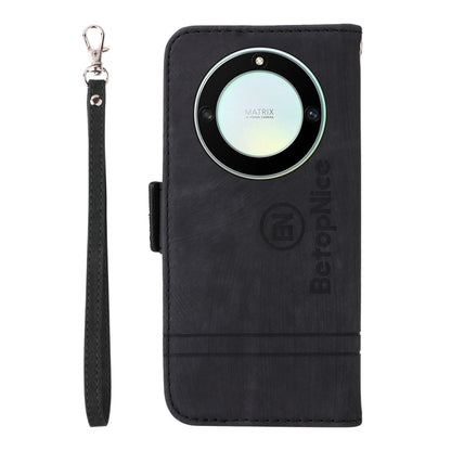 Black leather phone wallet case with wrist strap, circular magnetic kickstand panel.