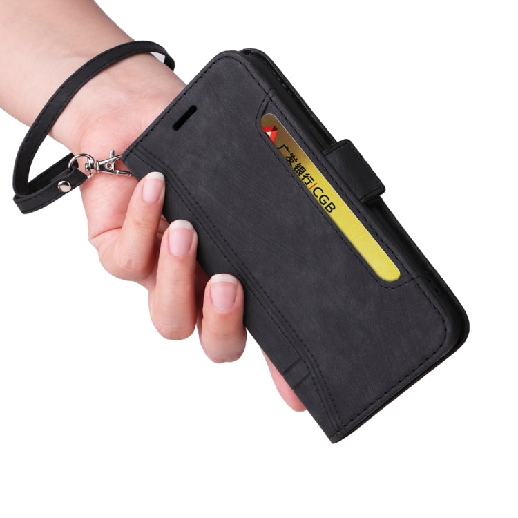 Black leather phone wallet case with wrist strap and vertical card pocket, side view.