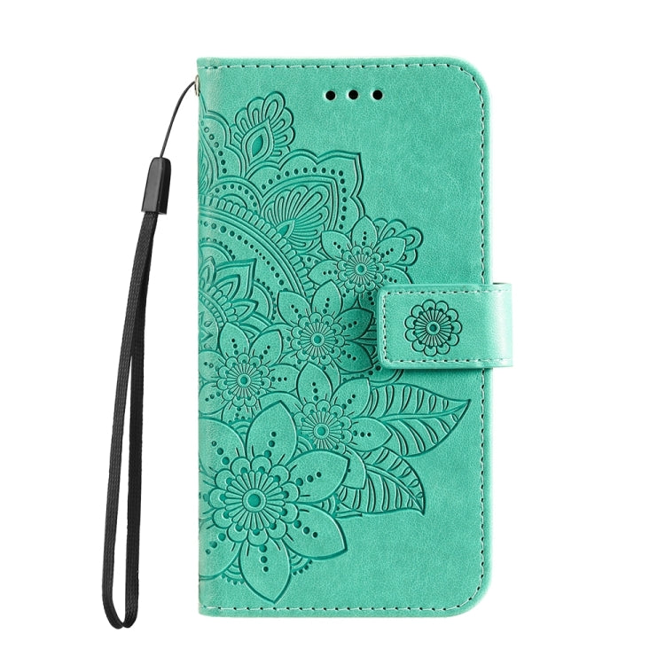 Green floral embossed leather phone wallet case with magnetic band and attached wrist strap.