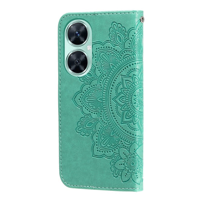 Green embossed floral leather phone case with dual camera cutouts.
