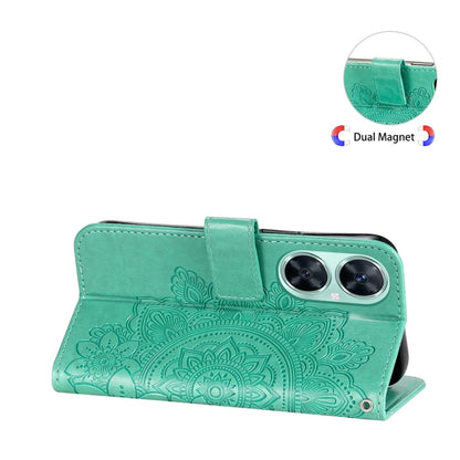 Green leather phone wallet case with stand flap and dual camera cutouts.