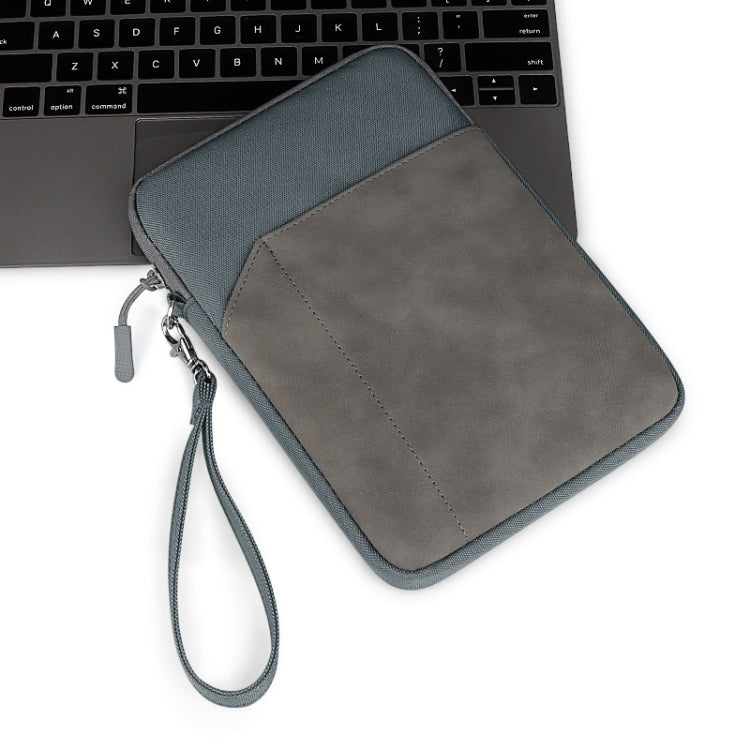Grey tablet sleeve pouch with wrist strap, angled view