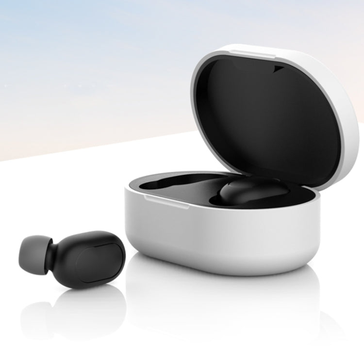 Silicone charging case cover in white, open with black earbuds seated inside