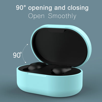 Silicone charging case cover in light blue, open with black earbuds inside