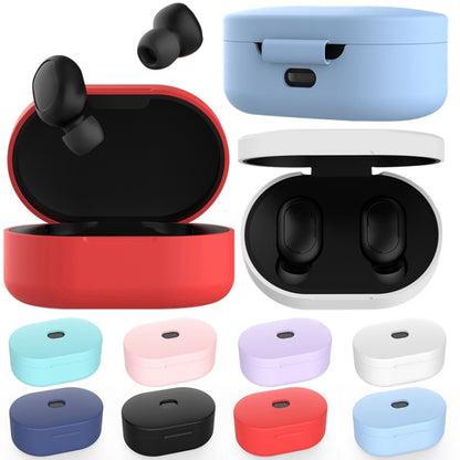 Silicone charging box protective case with earbud compartments, shown in multiple colors