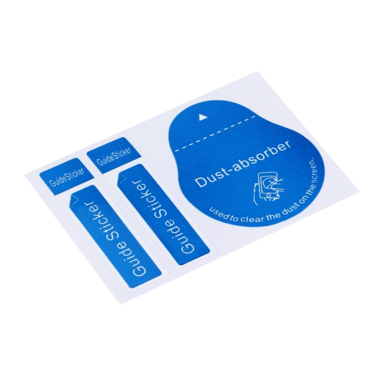 Blue dust-absorber and guide sticker set on backing, arranged at an angle