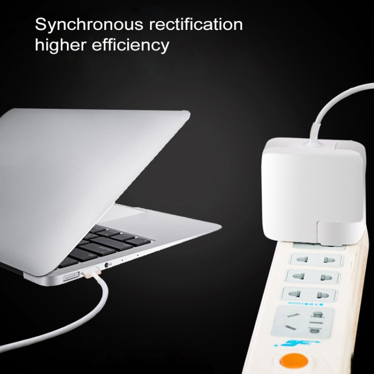 White EU Type-C power adapter connected to a laptop via charging cable