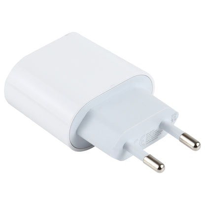 White EU plug USB-C wall charger with two metal prongs and side view of adapter