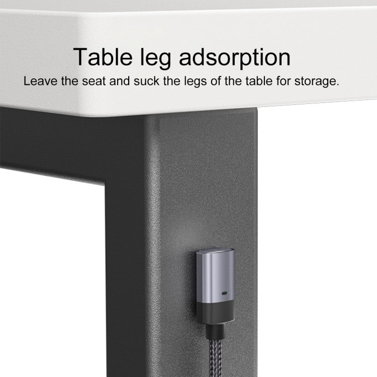 Magnetic charging head on braided cable attached to a table edge