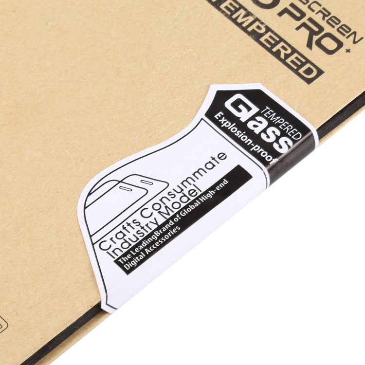 Tempered glass screen protector close-up: Glass label with dust- and shatter-proof text
