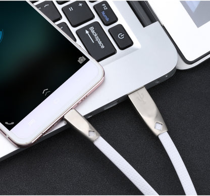 White USB to Micro-USB cable plugs connected to devices