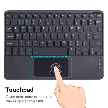 Portable Bluetooth keyboard touchpad area with a finger pointing at the trackpad