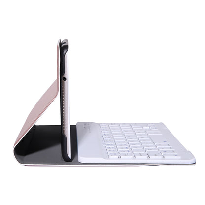 Rose gold folio with detachable Bluetooth keyboard extended, side stand view