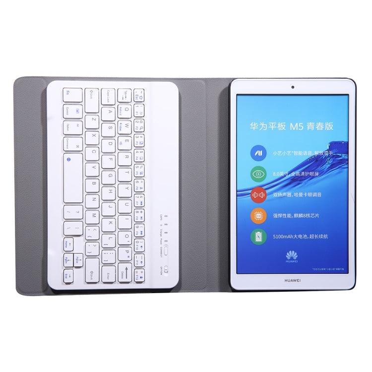Detachable keyboard in folio tablet case with tablet display and front stand