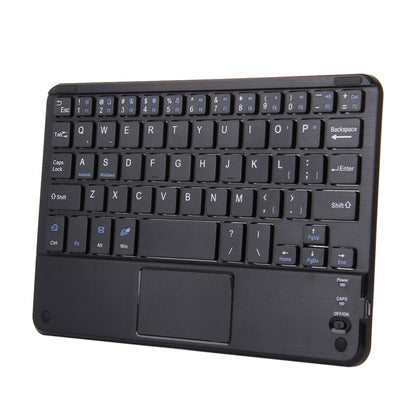 Black Bluetooth keyboard with touch panel, angled view of keycaps and track area