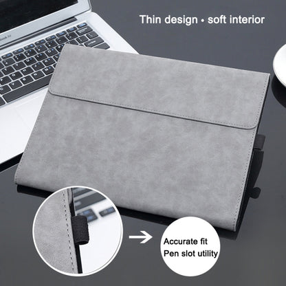Gray tablet sleeve with front flap and thin soft interior