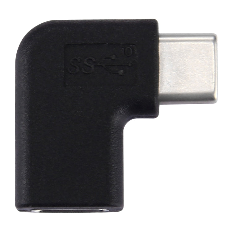 Black L-shaped adapter with USB-C plug, close-up of metal tip and housing