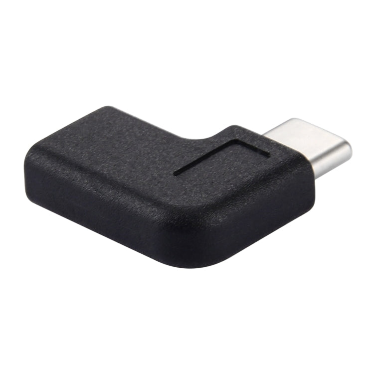 Black 90-degree USB-C adapter with grip notch, angled connector