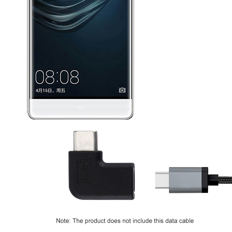 Black 90-degree USB-C adapter connected to smartphone display