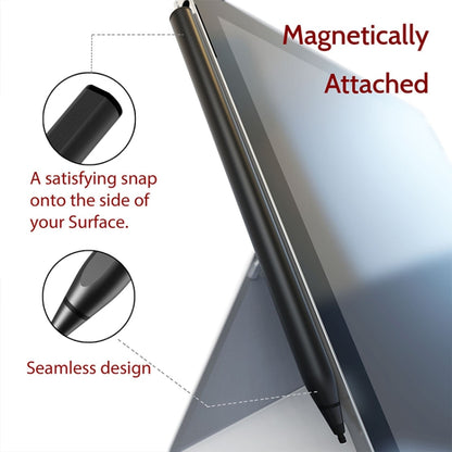 Black stylus pen held near a tablet edge, showing slim profile