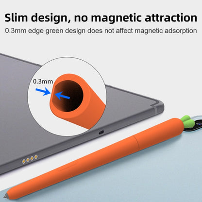 Orange carrot-shaped stylus with slim silicone edge near tablet