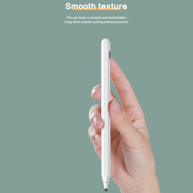 White capacitive stylus pen held in hand, smooth slim body and tip.