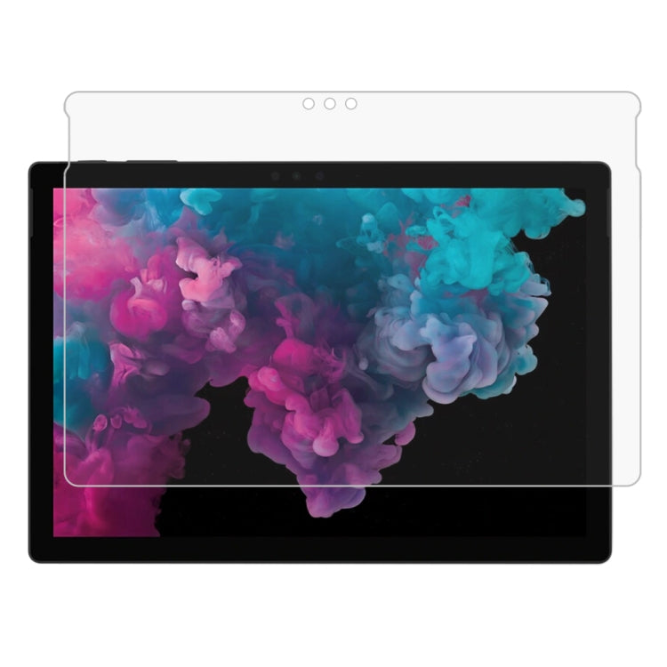 Tempered glass screen protector film on tablet screen with full-screen coverage