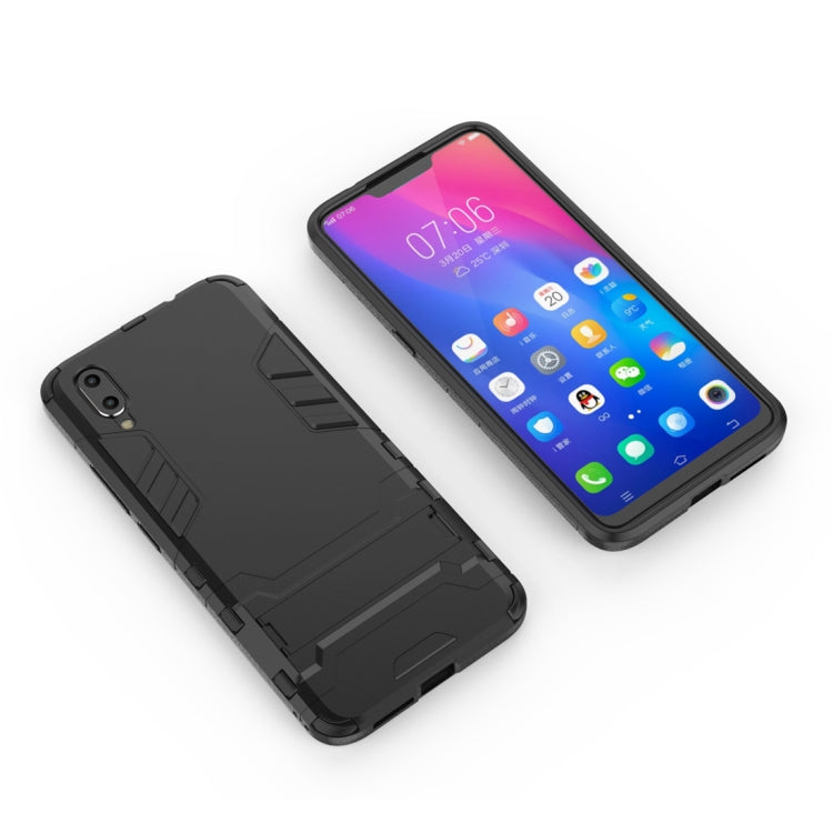 Black shockproof phone case with raised edges and textured grip panels