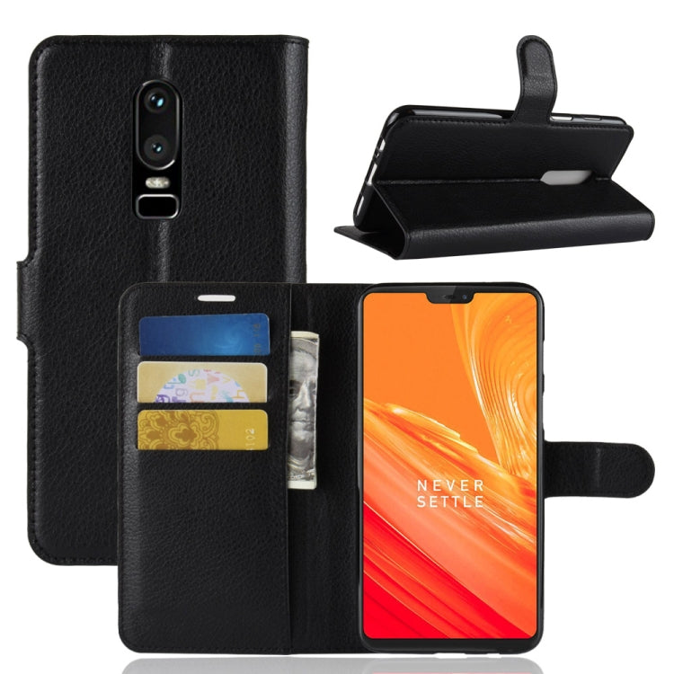 Black litchi-texture leather flip phone case with card slots and wallet holder
