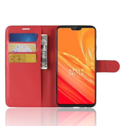 Red litchi-texture leather flip phone case with card slots and stand view