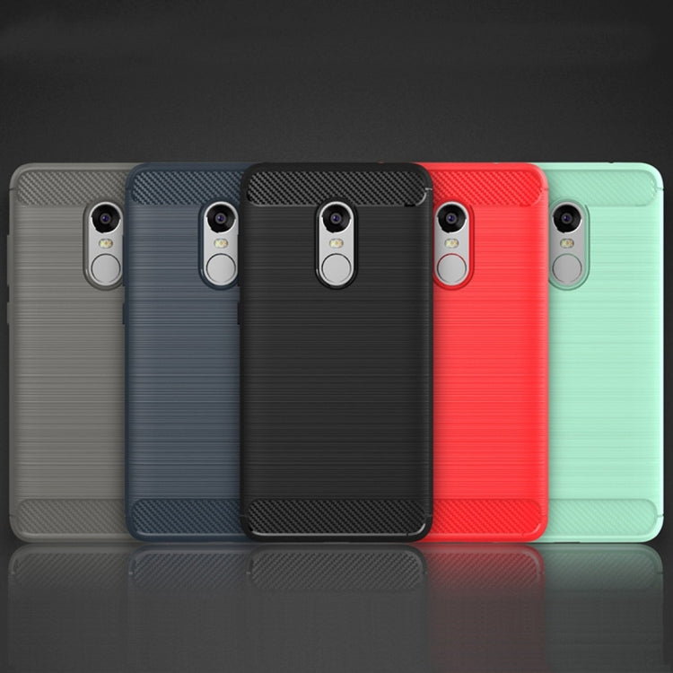 Set of textured TPU phone cases in black, dark blue, and red for Redmi Note 4X
