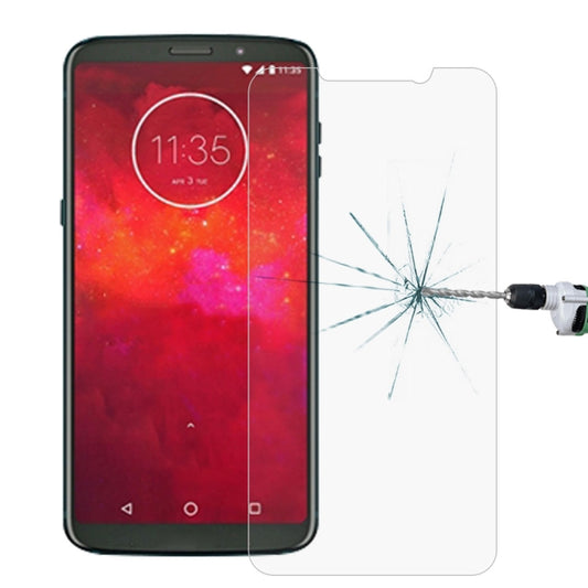 Clear tempered glass screen protector film on phone screen with shattered impact marks